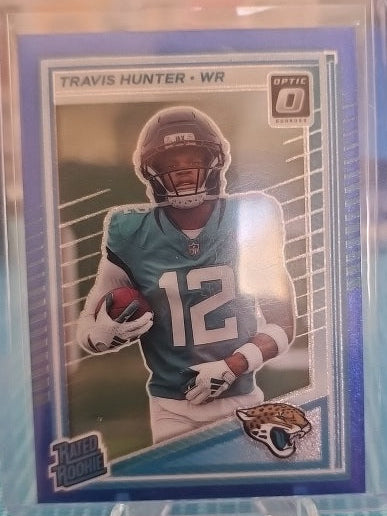 2025 Panini Donruss Optic - Rated Rookie Travis Hunter #201 Blue Glitter...